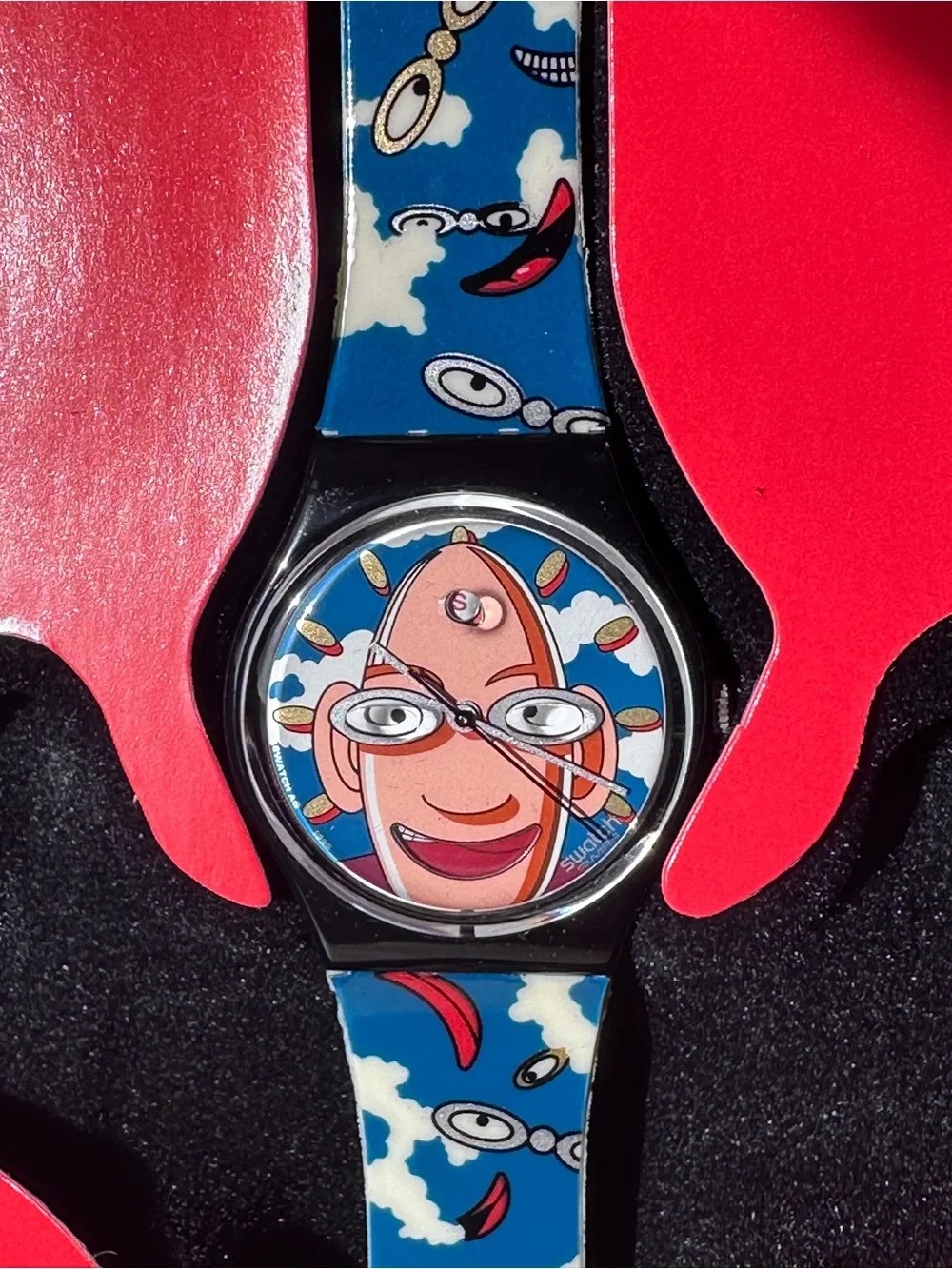 Swatch Club watch with display case and brooch
